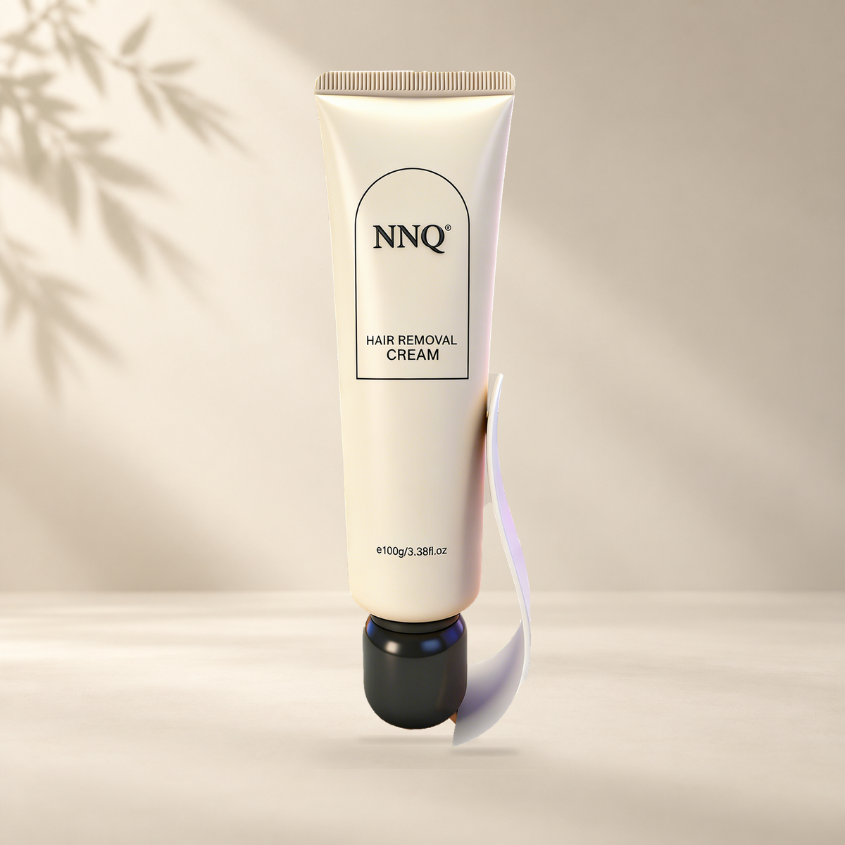 NNQ Hair Removal Cream 100 g tube with included scraper in a warm ivory setting